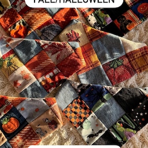 May include: A collection of patchwork bandanas featuring various autumn and Halloween-themed fabric squares, including pumpkins, leaves, and spooky motifs. Text overlays read LARGE FALL/HALLOWEEN and ALL BANDANAS WILL HAVE A NOVA DOOD TAG SEWN ON THE LOWER RIGHT SIDE.