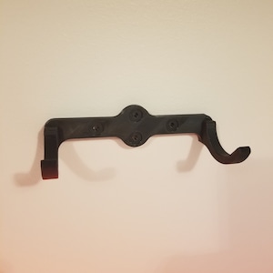 Lightsaber Wall Mount  -  Wall mount for lightsaber with vertical or horizontal screw holes
