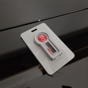 Dual ID Badge and Single RSA Token Holder ; Secure token holder