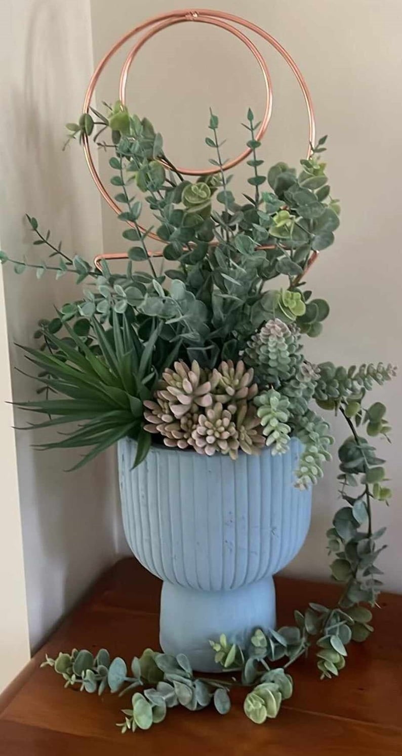 Create your own stunning plant arrangement with these decorative plant stakes. Exquisite Style.