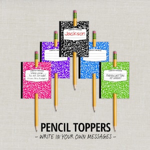 May include: A display of composition notebooks in various colours, including pink, purple, black, blue, and green, each topped with a pencil. The notebooks have text that reads "Welcome to 1st Grade!", "Jackson", and "Happy Last Day of School!" The image also includes the text "PENCIL TOPPERS - WRITE IN YOUR OWN MESSAGES -"