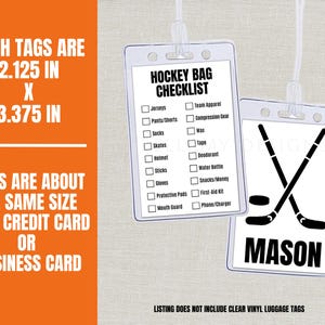 May include: Two clear plastic luggage tags. One tag has a hockey bag checklist, and the other has a hockey stick and puck graphic with the name "MASON". The tags are 2.125 inches by 3.375 inches, about the size of a credit card.