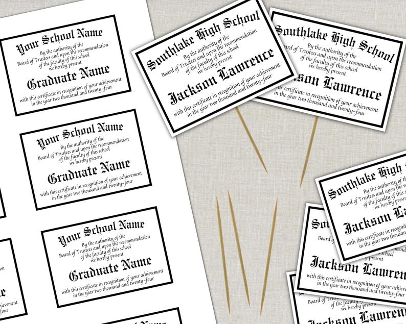 May include: Printed certificates with black borders and text. Some certificates read "Your School Name" and "Graduate Name." Others say "Southlake High School" and "Jackson Lawrence." The certificates are on a light-colored surface.