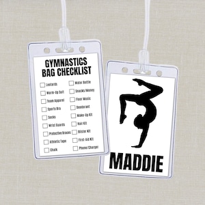 May include: Two clear plastic ID holders with white lanyards. One has a gymnastics bag checklist, the other a gymnast silhouette and the name "MADDIE". The checklist includes items like leotards and water bottles.