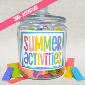 May include: A clear glass jar with a lid, filled with colorful paper slips. A white label on the front features the text "SUMMER ACTIVITIES" in multi-colored letters, with a pink diagonal banner above reading "200+ ACTIVITIES".