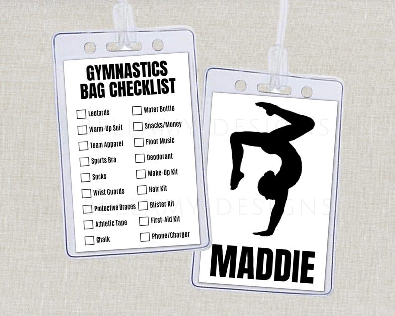 May include: Two clear plastic badge holders with white inserts. One lists a gymnastics bag checklist, including items like leotards and water bottles. The other features a black gymnast silhouette and the name "MADDIE".