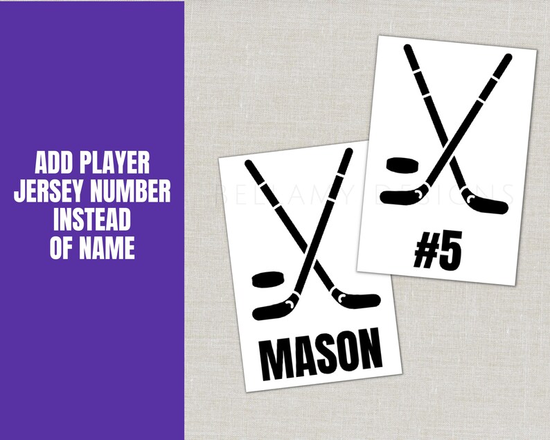 May include: Two white cards with black hockey stick and puck graphics. One card has the name "MASON" and the other has the number "5". A purple background on the left has the text "ADD PLAYER JERSEY NUMBER INSTEAD OF NAME".