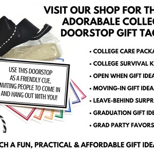 May include: A college doorstop gift tag with a black and white bow, a white tag with black text, and colorful gift tags. The text on the tag reads: "USE THIS DOORSTOP AS A FRIENDLY CUE, INVITING PEOPLE TO COME IN AND HANG OUT WITH YOU!"
