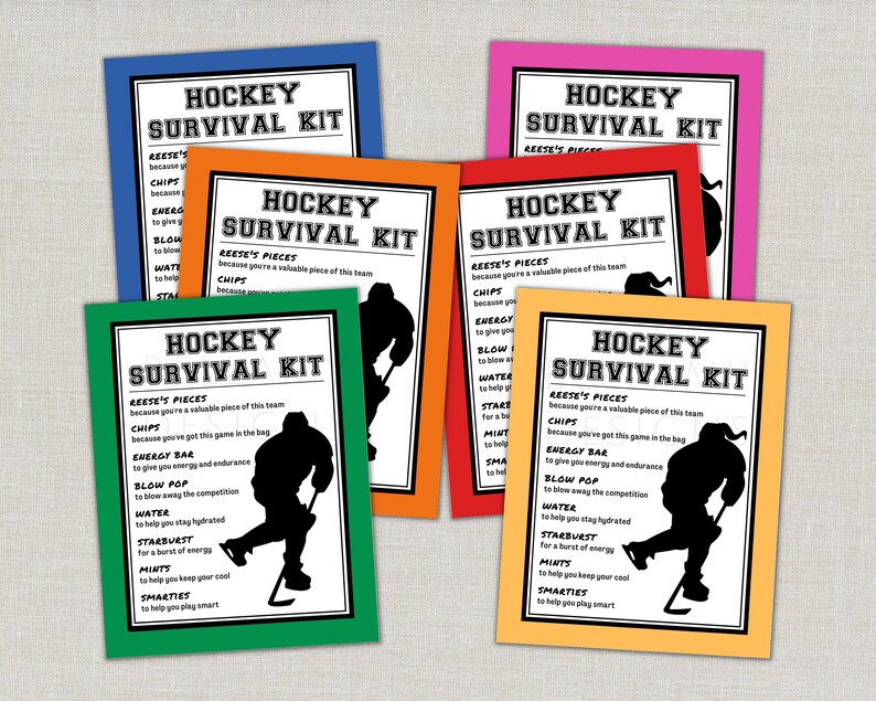 May include: A collection of colorful cards labeled "Hockey Survival Kit." Each card features a black silhouette of a hockey player and a list of items like Reese's Pieces and chips. The cards have colored borders.
