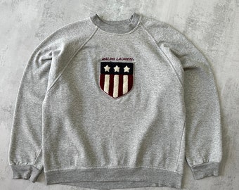 Sudadera vintage Polo Sport Ralph Lauren talla L, estilo años 90, con cuello redondo y logo estampado.