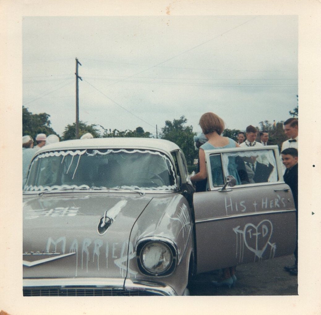 Vernacular Photograph Vintage Photo Snapshot Just married couple wedding getting into vintage car Original Found Photo
