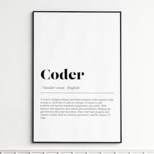 May include: A framed print featuring the word "Coder" in a bold black font. Beneath, a definition of "Coder" is provided in smaller black text. The print is in a black frame, ideal for home or office display.