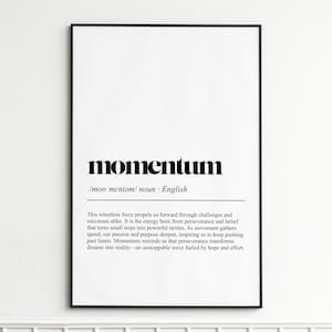 May include: Black framed print with the word "momentum" in bold, black font. Below the word is the phonetic pronunciation and the word "noun". The print includes a definition of momentum in English.