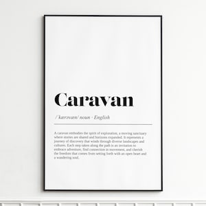 May include: A black framed print featuring the word "Caravan" in a bold, black font. The print includes the phonetic pronunciation and the word "noun". The text describes the spirit of exploration and adventure.