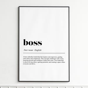 May include: A framed print with the word "boss" in bold black font. Below the word is the phonetic pronunciation and the word "English". The definition of "boss" is printed below the word.