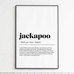 May include: Black framed print with the word "jackapoo" in bold black font. Below the word is the phonetic pronunciation and the word "noun". The definition of jackapoo is also included in the print.