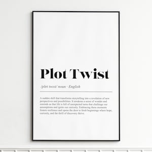 May include: A framed print featuring the words "Plot Twist" in bold black lettering. Beneath, a definition of the term is provided in smaller black text on a white background. The frame is black.