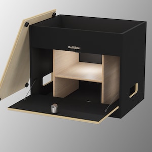 May include: A black wooden storage box with a hinged lid and a pull-out drawer. The box has a built-in shelf and a light inside. The box is labeled "BuiltBox".