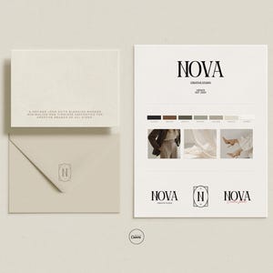 May include: A stationery set featuring a business logo design. The set includes a business card, envelope, and a presentation sheet with the logo, color palette, and sample images. The logo is in black, and the stationery is in neutral tones.