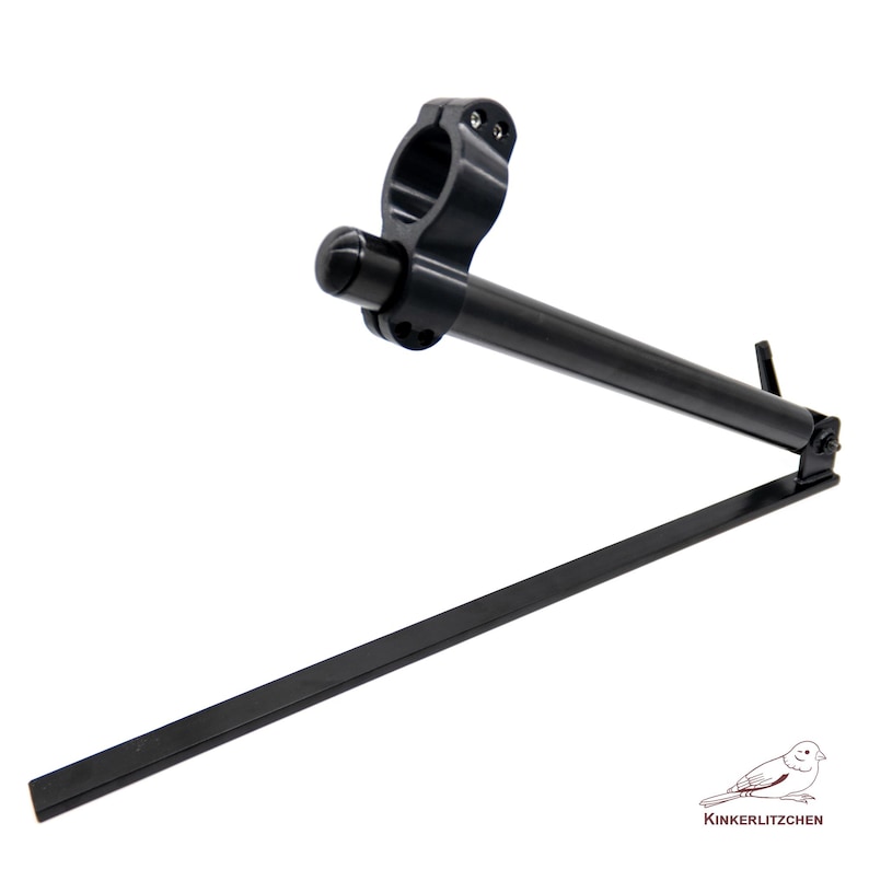 May include: A black metal clamp with an adjustable arm and a long, flat bar. The clamp has a rounded knob and a circular opening. The arm extends to a hinged joint, and the bar extends downward. The product is likely a mounting bracket or support.