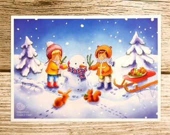 Postkarte "Kinder im Winter bauen einen Schneemann" - Grußkarte, Geschenkkarte, A6