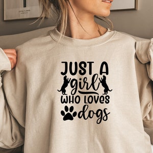 Nur ein Mädchen, das Hunde liebt