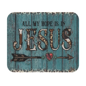 May include: A turquoise blue wooden sign with a distressed look. The sign has the words "All my hope is in JESUS" with a brown arrow and a red heart with turquoise jewels.