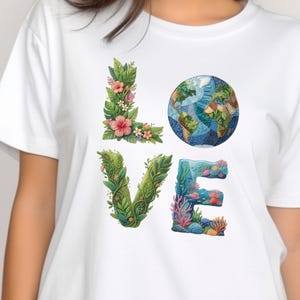 May include: White t-shirt with the word "LOVE" in a unique design. The "L" is formed from green leaves and pink flowers, the "O" is a globe, the "V" is made of green leaves, and the "E" is designed with coral and sea life.