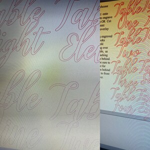 May include: A close-up of a computer screen showing a design for a table number. The design is for a table number with the word "Table" written in a cursive font. The numbers one through four are also written in cursive font. The text on the screen says "choose to engrave OR Cut overlay 3 engraved books old ig over ple, as ackin behind. be sure to n behind to front er."
