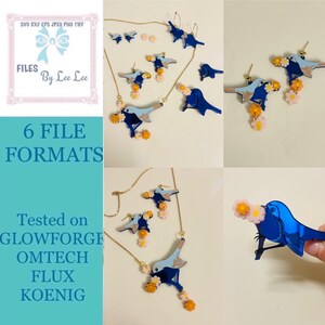 May include: A collection of blue bird-shaped jewelry, including earrings and a necklace, adorned with small orange and pink flowers. The image also shows text that reads "6 FILE FORMATS" and "Tested on GLOWFORGE OMTECH FLUX KOENIG".