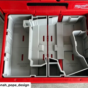 May include: An open red Milwaukee Packout toolbox with a gray plastic organizer insert. The organizer has multiple compartments and dividers. The text "JONAH POPE DESIGN" is printed on the organizer.