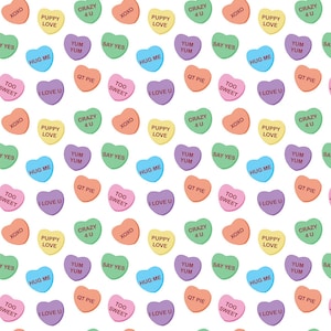May include: A repeating pattern of colorful candy hearts with various phrases like "I LOVE U," "XOXO," and "PUPPY LOVE" on a white background. The hearts are in shades of pink, yellow, green, purple, and orange.