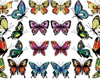 May include: A collection of colorful butterfly decals in various sizes and designs. The butterflies feature vibrant hues of yellow, blue, green, red, and purple. The image includes the number "5106" in the upper left corner.