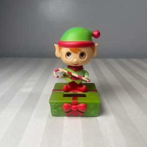 Solar-Powered Christmas Elf Bobble Head w/ Candy Cane with Present Base