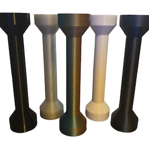 May include: Five cylindrical objects in black, silver, bronze, white, and dark blue. Each has a flared top and base, connected by a straight, elongated body. The objects are arranged vertically, side-by-side, against a white background.
