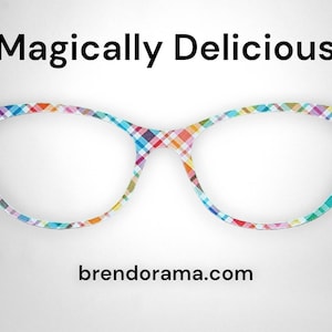 May include: A pair of colorful, plaid eyeglasses with a white background. The text "Magically Delicious" is above the glasses and "brendorama.com" is below the glasses.