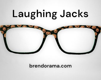 Laughing Jacks - the cutest little giggling pumpkins over a black split