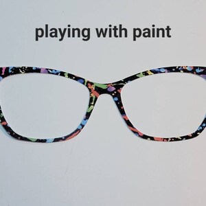 Playing With Paint - bright splatters on a black background