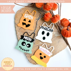 May include: Four Halloween-themed cut-out designs, including a pumpkin, ghost, Frankenstein, and candy corn, each with a name. The designs are orange, white, mint green, and yellow. The image includes the text "LASER READY - INSTANT DIGITAL DOWNLOAD" and "DIGITAL SVG CUT FILE + COMMERCIAL USE".