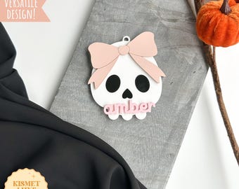 Etiqueta de nome de caveira com laço de Halloween: arquivo SVG: design cortado a laser