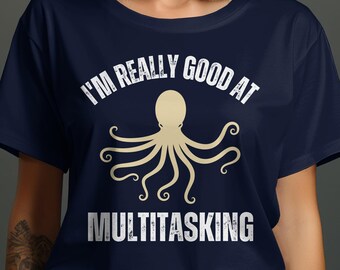 May include: A navy blue t-shirt with a white octopus graphic and the text "I'm really good at multitasking".