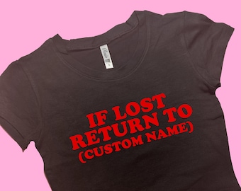 May include: Black cropped t-shirt with red text that reads "IF LOST RETURN TO (CUSTOM NAME)"