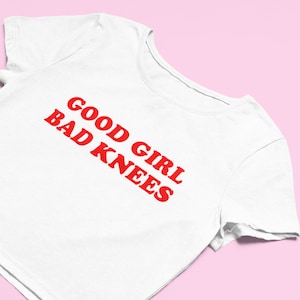 Good Girl Bad Knees Crop Top | Flowy Fit Crop Top | Cute Top | Trendy Top | Funny Shirt | Cute Gift | Y2K Crop Top | Gift for Girlfriend |