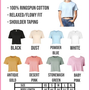 May include: A size chart for a crop top short sleeve shirt made of 100% ringspun cotton. The chart shows the measurements for body length, body width, and sleeve length in inches for sizes XS, S, M, L, and XL. The shirt is available in 10 colors: black, dust, powder blue, white, antique gold, desert pink, stonewash green, baby pink.