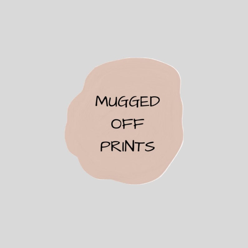 May include: A light pink circle with the text "Mugged Off Prints" in black.