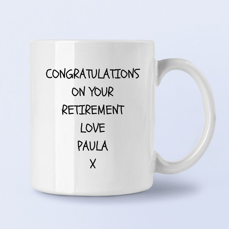 May include: White ceramic mug with black text that reads "Congratulations on your retirement Love Paula X".