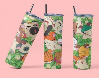 May include: Three stainless steel tumblers with a green and white design featuring cartoon hamsters. The tumblers are printed with a variety of hamsters in different poses and expressions.