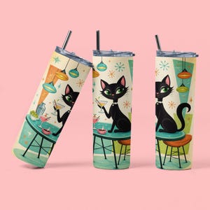 May include: Three tall, insulated tumblers with a retro design featuring a black cat holding a martini. The cat is seated at a teal table with a cocktail. The background has starbursts and hanging lamps. Each tumbler has a silver straw.
