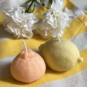 Duo of natural and artisanal candles, in the shape of lemon & orange, rapeseed wax