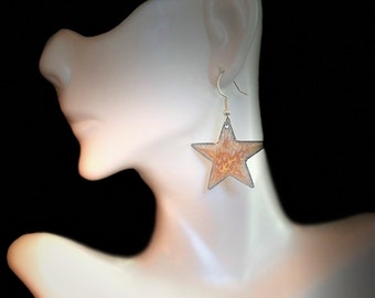 golden star shape enamel dangle earrings, starburst. fire look effect, sterling silver ear wires